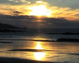 Wales beach and environmentally sustainable development in the developed world. Image by Information for Action, a website for conservation and environmental issues offering solutions